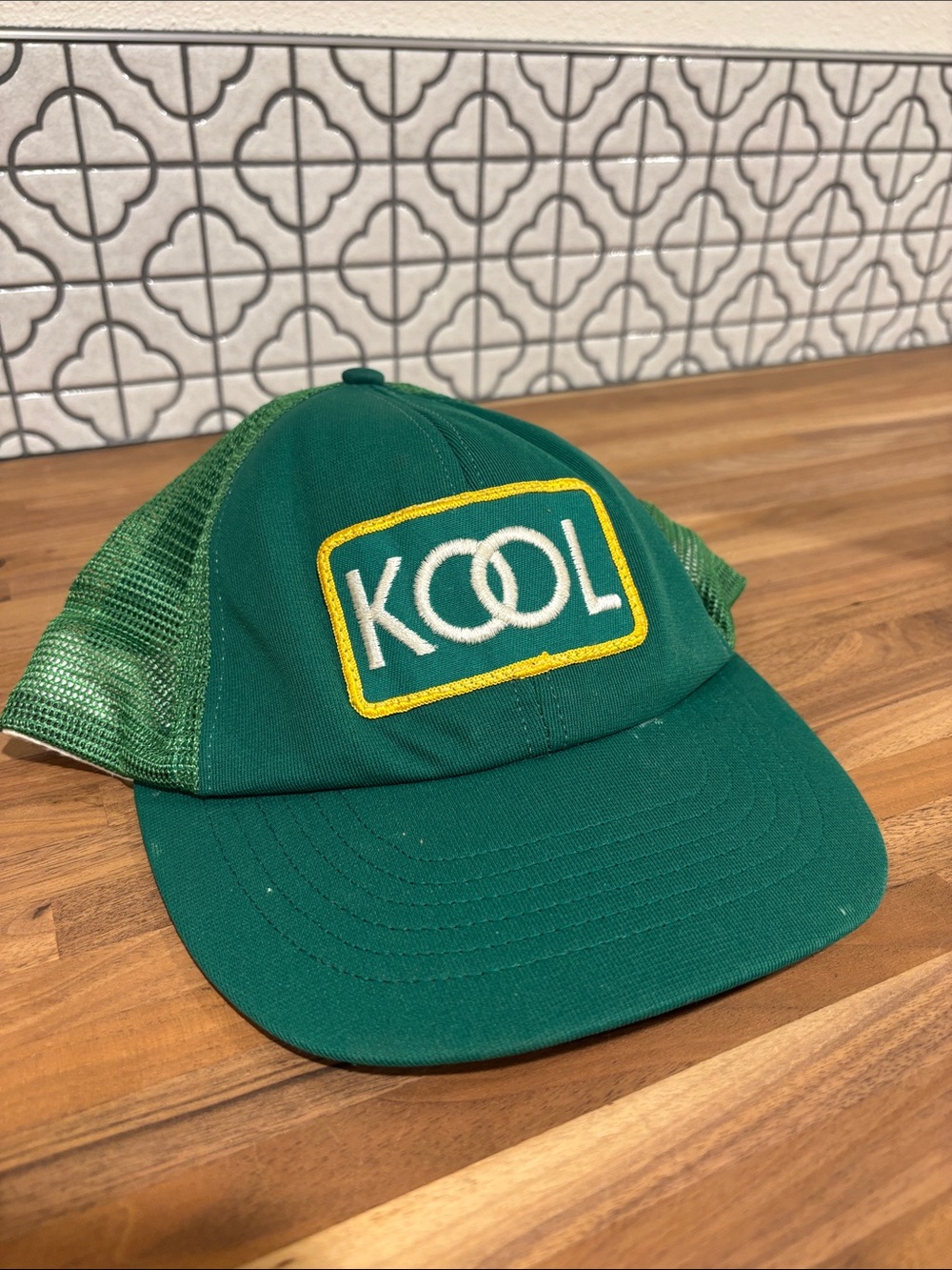 Vintage green KOOL Trucker Hat with Yellow-Outlined Patch